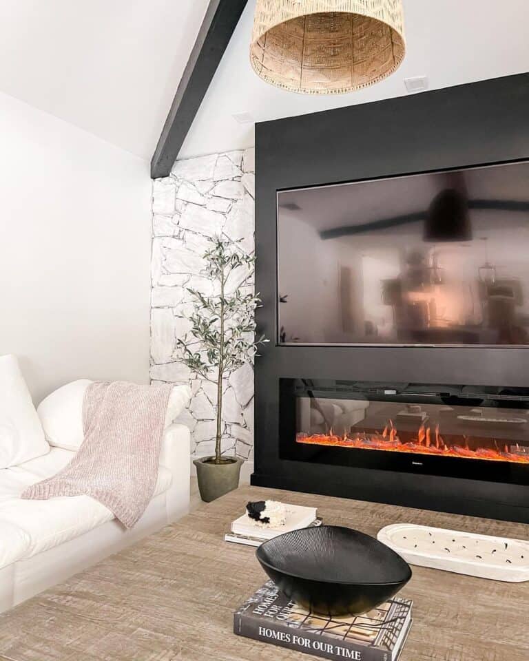 Black Electric Fireplace with Mounted TV