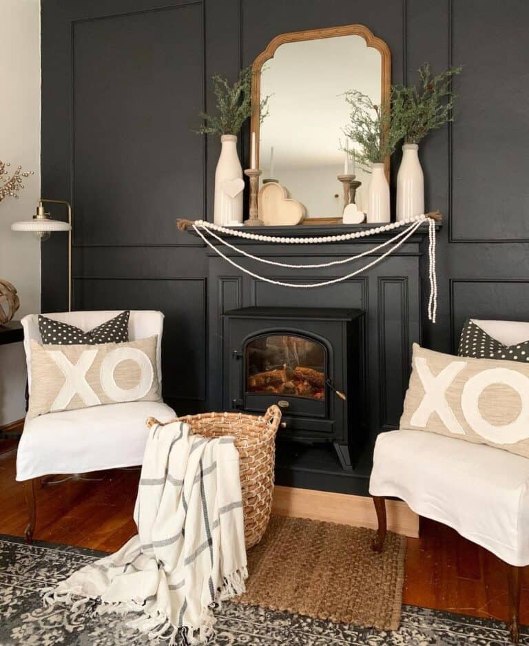 Black Fireplace Surround with White Decor