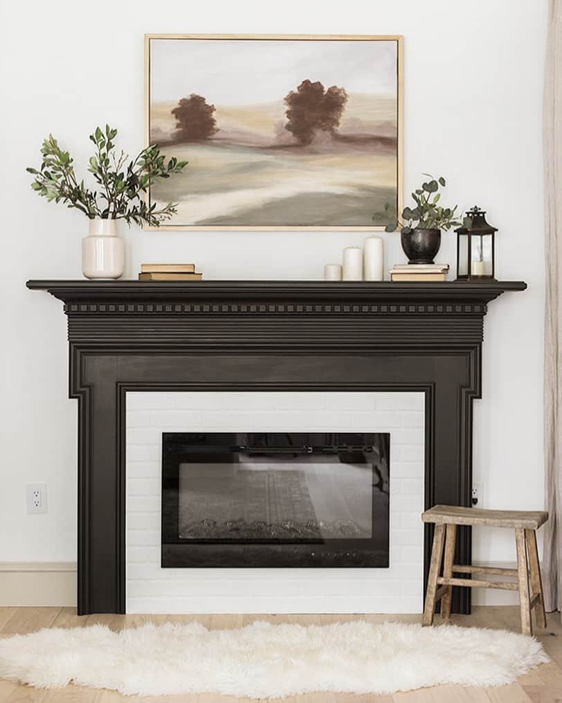 Black Fireplace with Abstract Wall Art