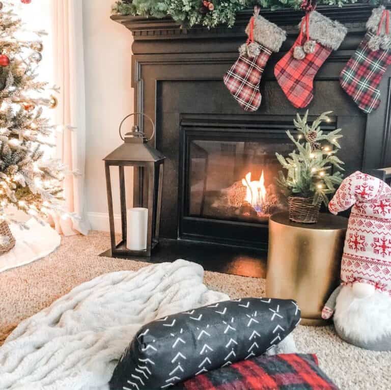 Black Fireplace with Hanging Christmas Stockings