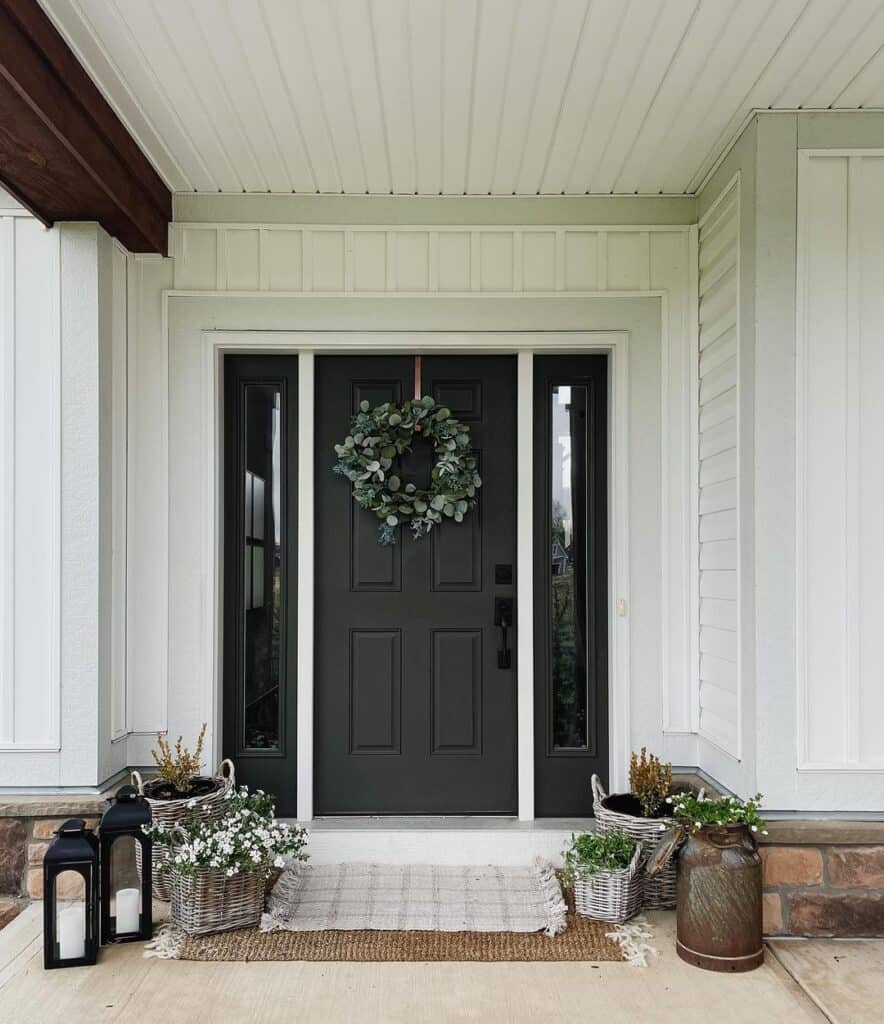 Black Front Door with Gray Wicker Planters