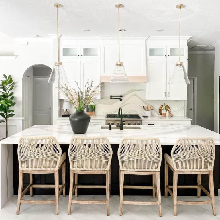 Black Island and Fixtures in White Kitchen