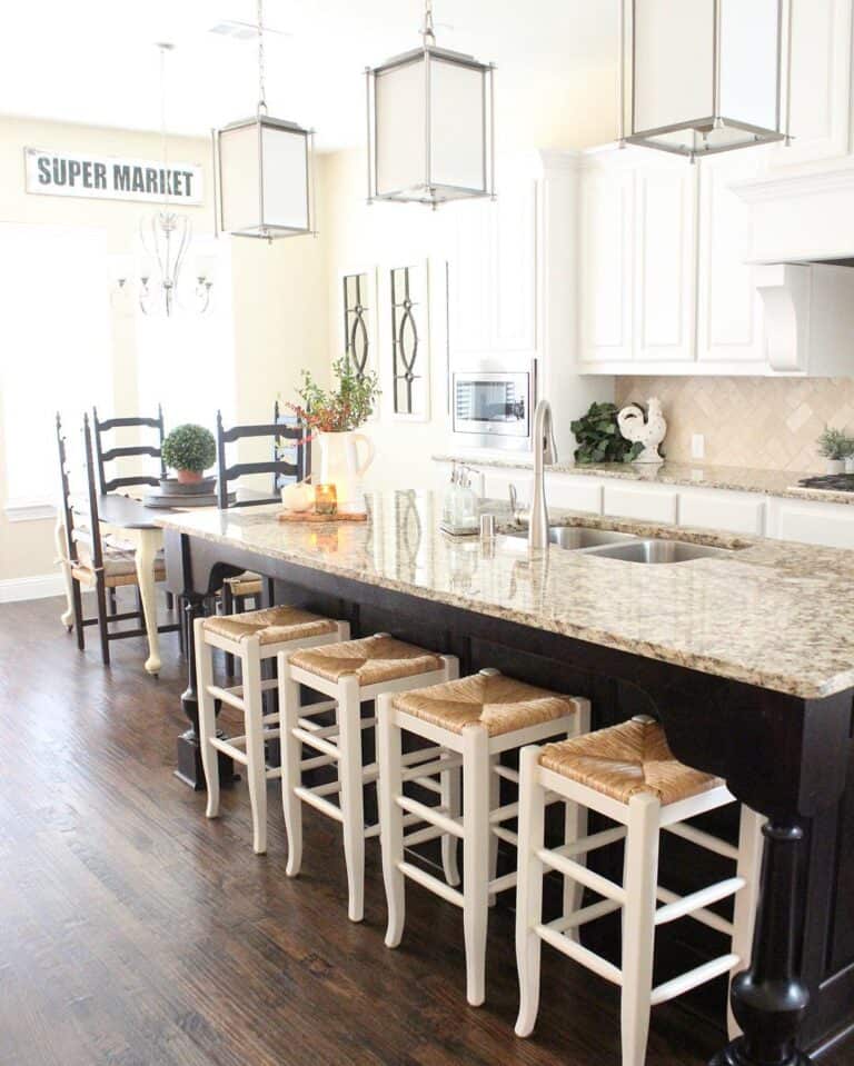 Black Kitchen Island on Dark Wood Flooring
