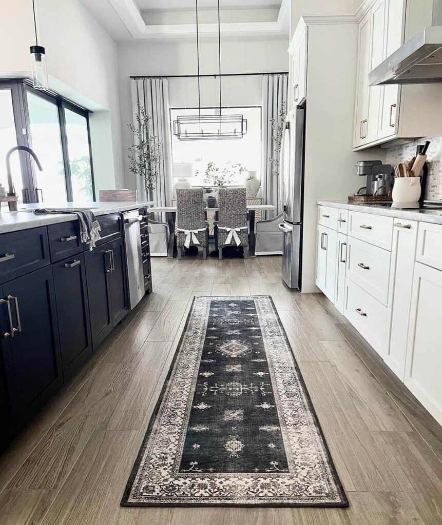 Black Kitchen Runner Rug Between Black and White Cabinets - Soul
