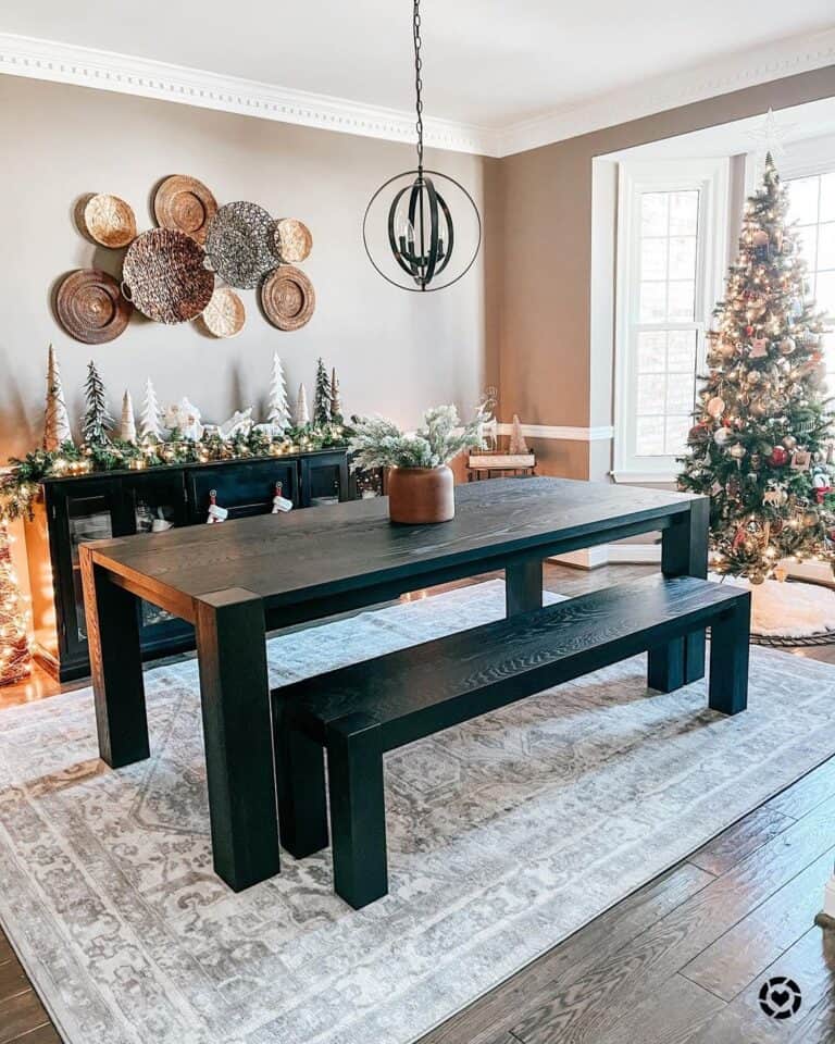 Black Sideboard Covered with Greens