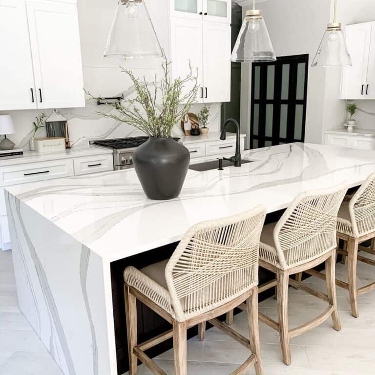 Beige Wicker Chairs in Marbled Kitchen