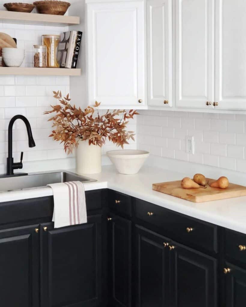 Black and White Kitchen Cabinets with Gold Knobs