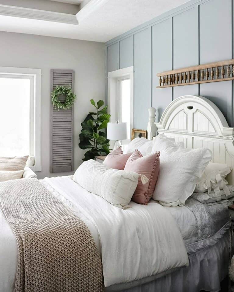 Blue Accent Wall in Bedroom with Greenery