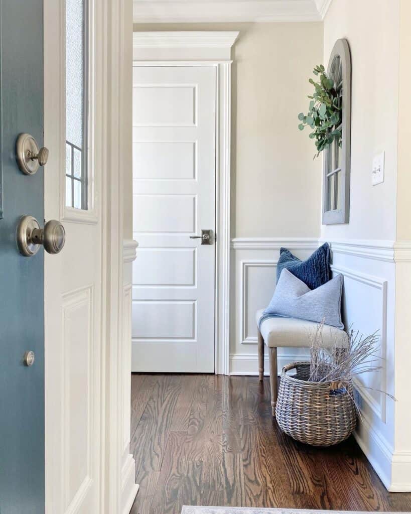 Blue Accents in Bright Hallway with Wainscotting