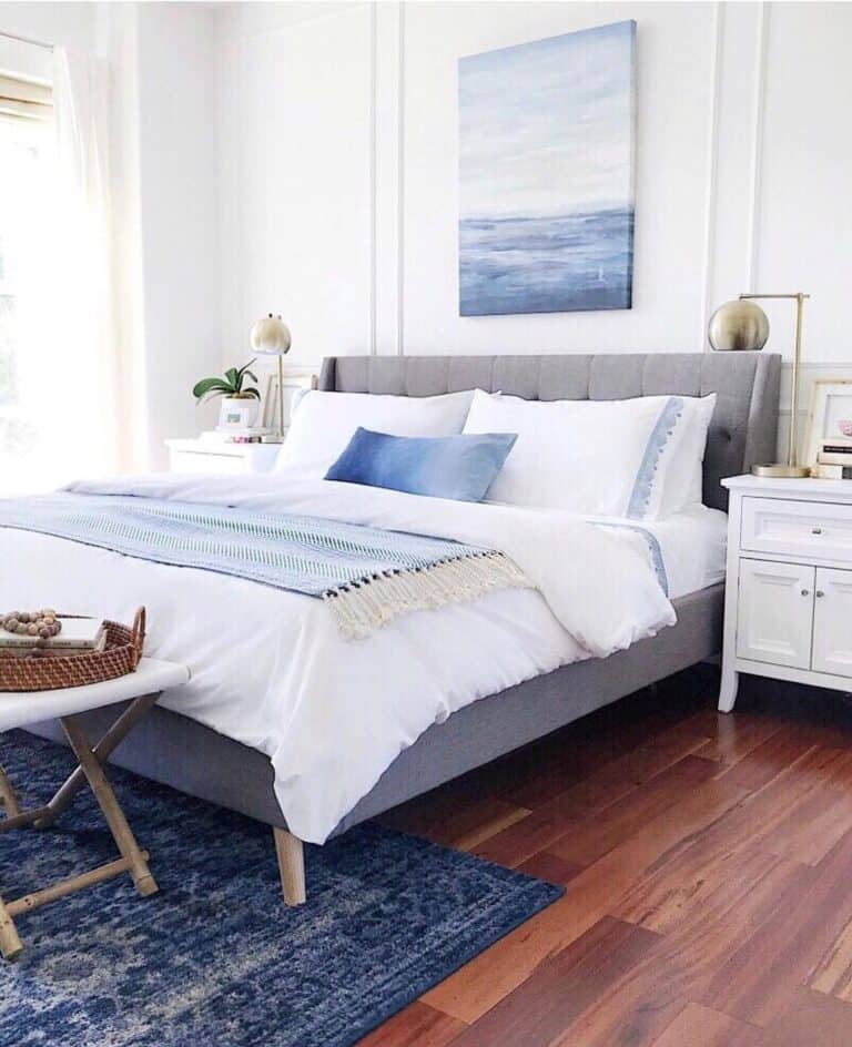 Blue Area Rug Under Bed With White Bedding