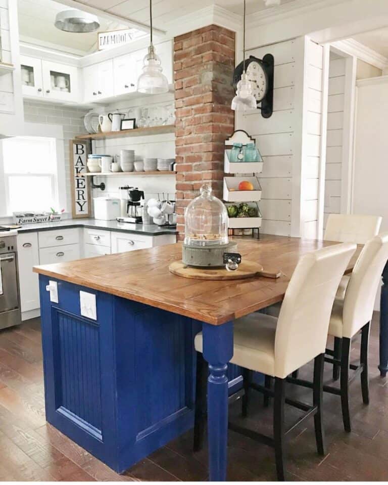 Blue Kitchen Island With White Seating