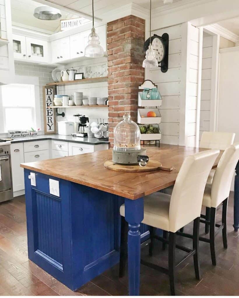 Blue Kitchen Island With White Seating