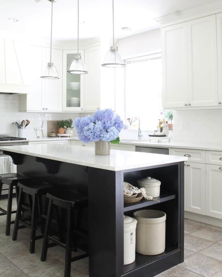 Blue flowers on a Black and White Kitchen Island