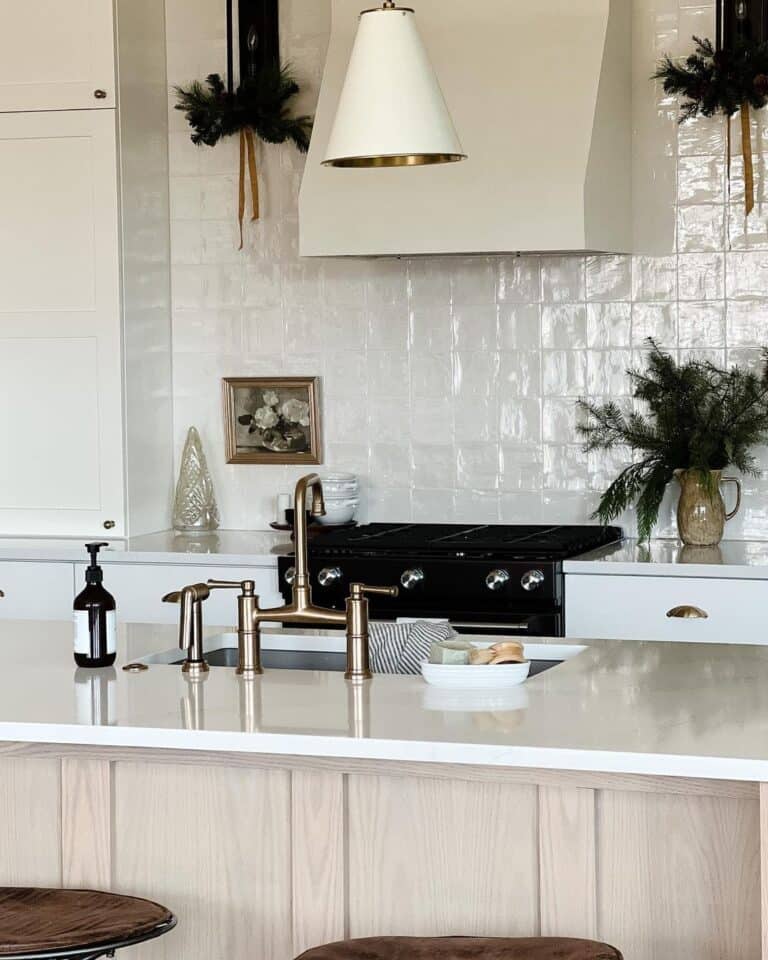 Brass Faucet on a Light Wood Kitchen Island