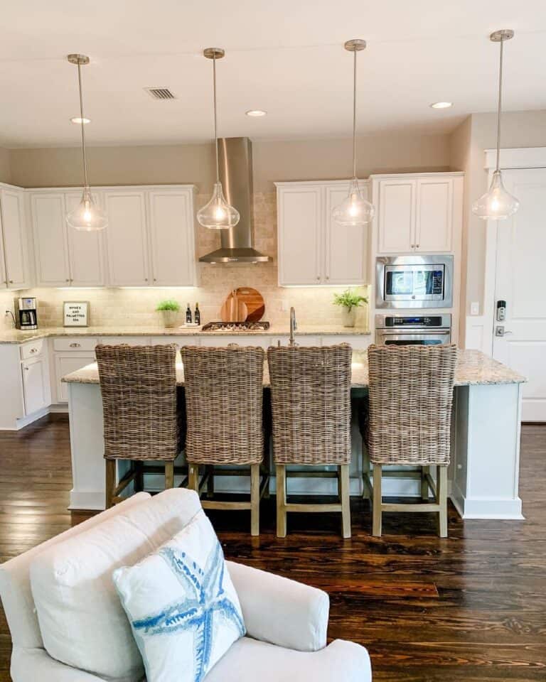 Brick Backsplash and Glass Pendant Lighting