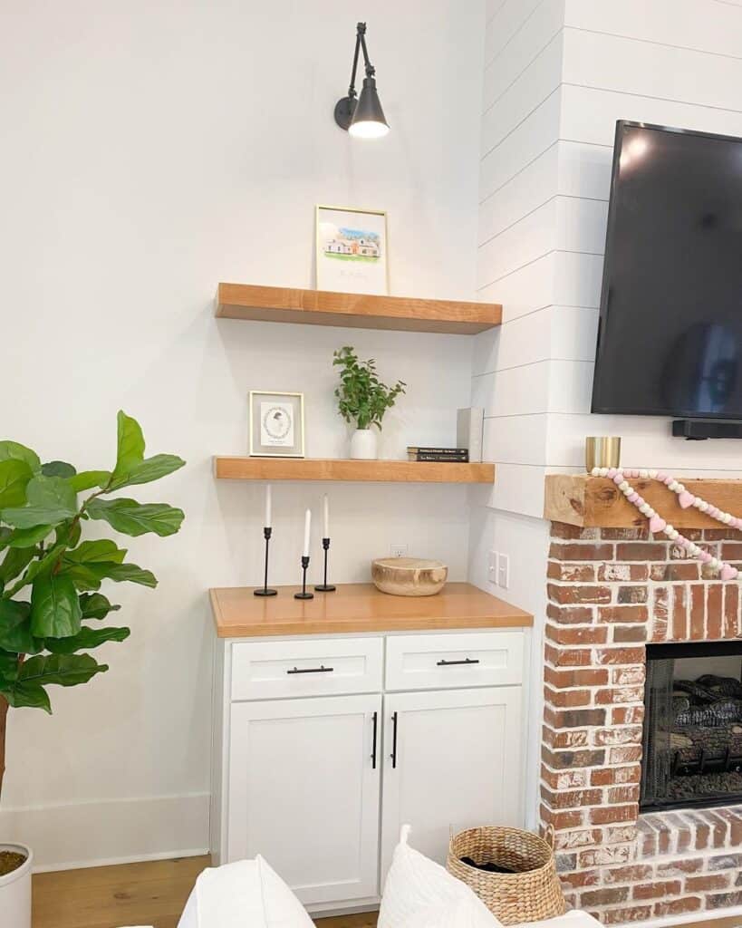 Brick Fireplace with Shiplap and Floating Shelves