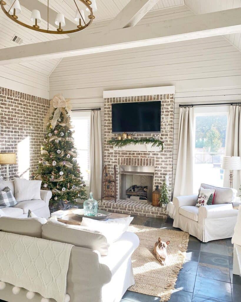 Brick Fireplace with White Shiplap Vaulted Ceiling
