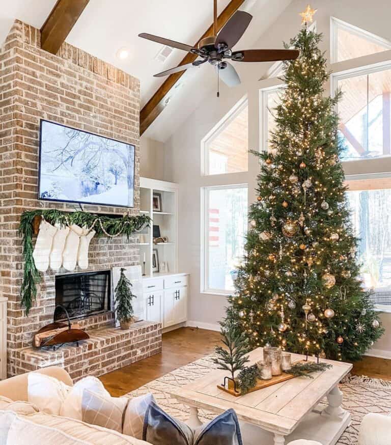 Brick Fireplace with Wood Beam Vaulted Ceiling