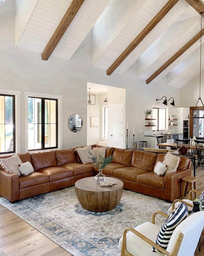 Brown Leather Sectional with Drum Coffee Table