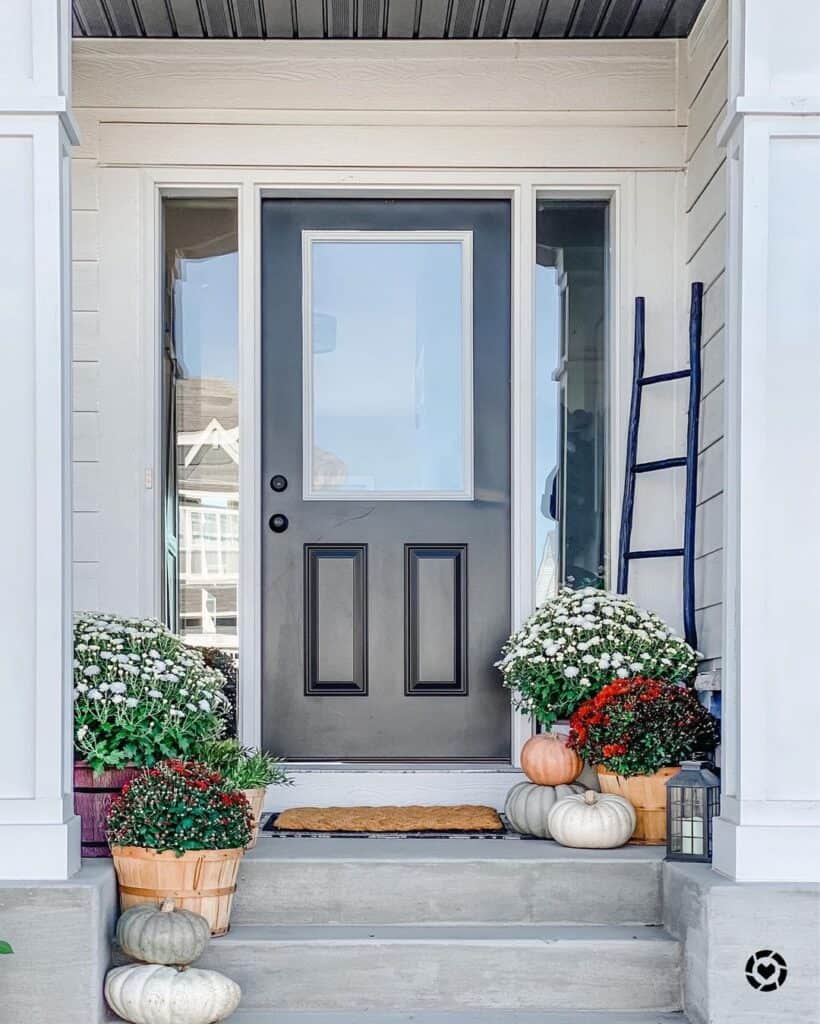 Concrete Front Steps with Black Front Door