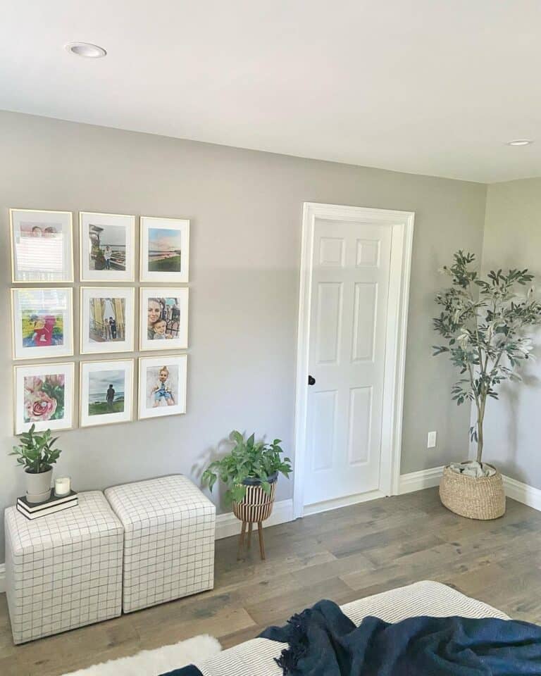 Cube Ottomans Beneath Bedroom Gallery Wall