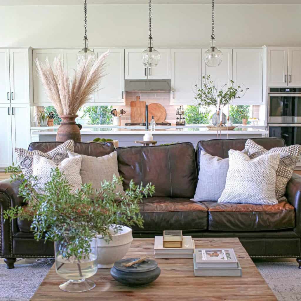 Dark Brown Leather Couch with Accent Pillows