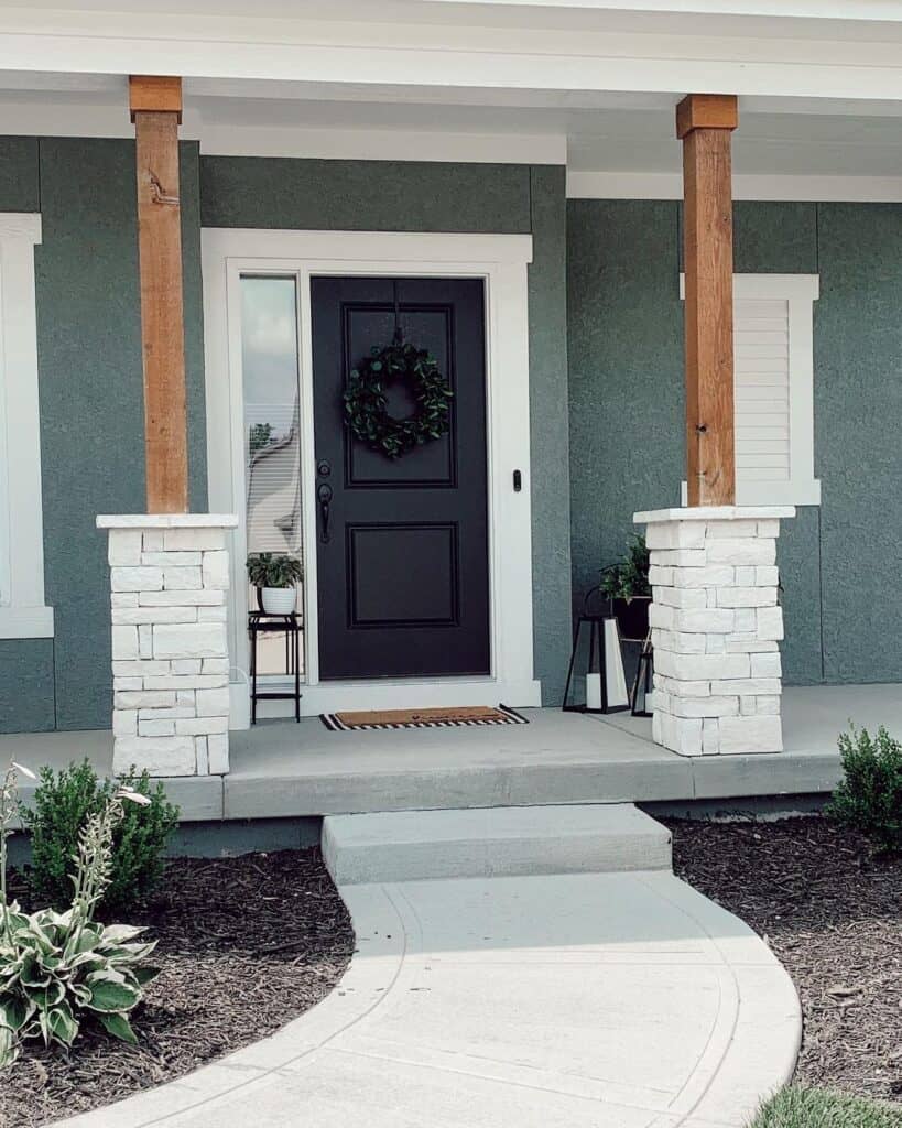 Dark Gray Stucco Home with Black Front Door