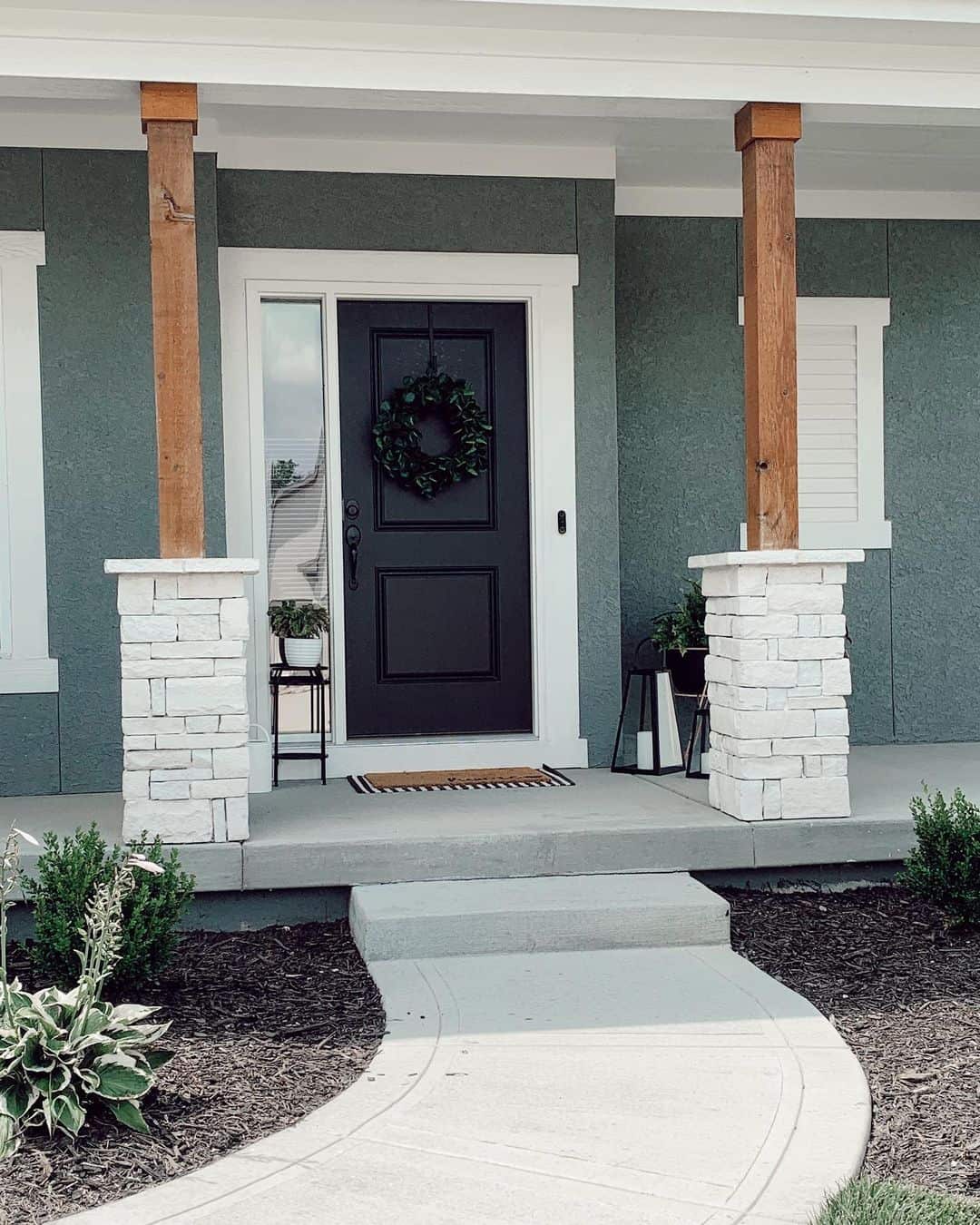 Dark Gray Stucco Home with Black Front Door Soul & Lane