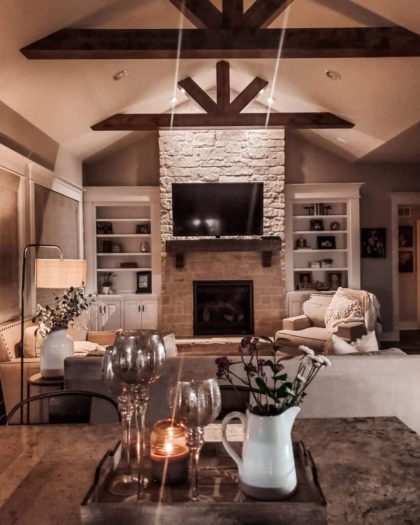 Dark Wood Vaulted Ceiling and Stone Fireplace