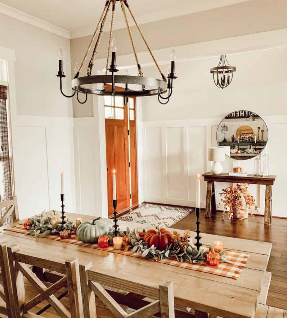 Dining Room with Fall Décor and Chandelier