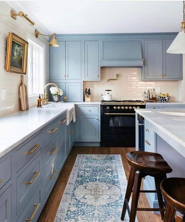 Farmhouse Blue Kitchen Cabinets with Brass Accents