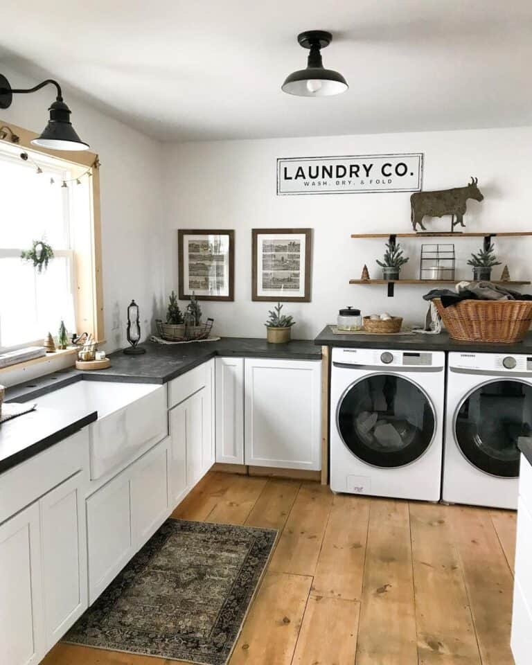 Farmhouse Laundry Room with Stained Wood Flooring