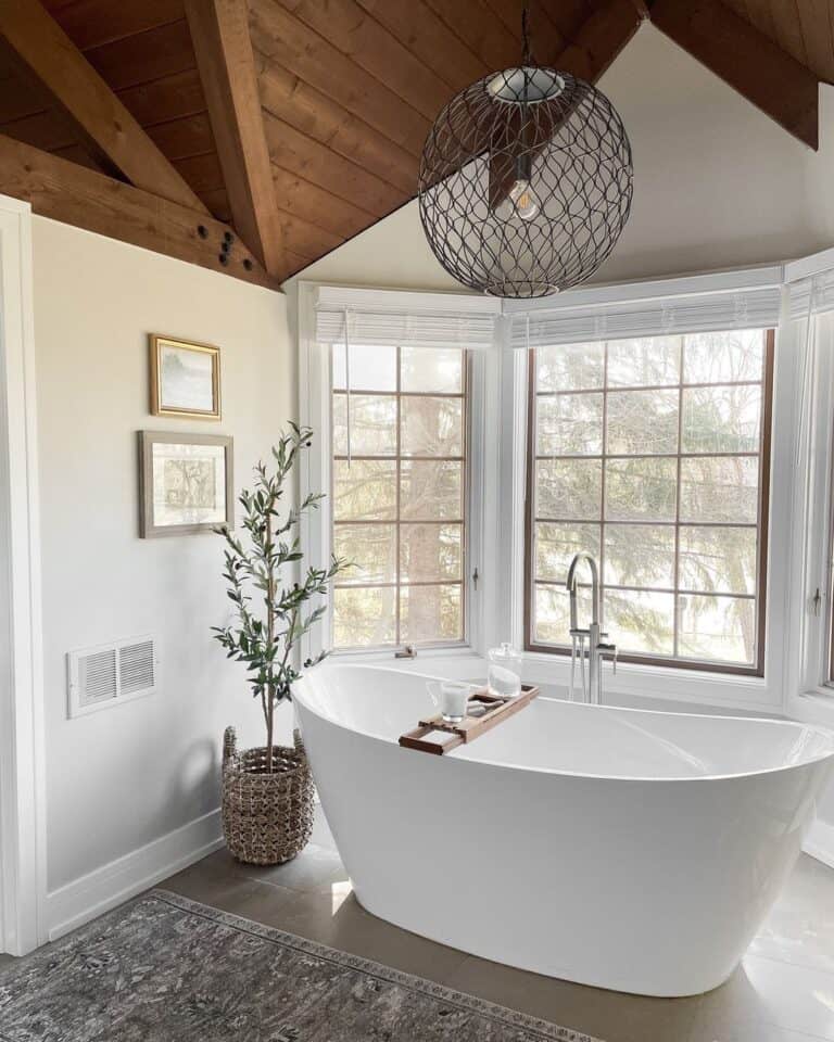 Freestanding Bathtub Beneath Wood Bathroom Ceiling
