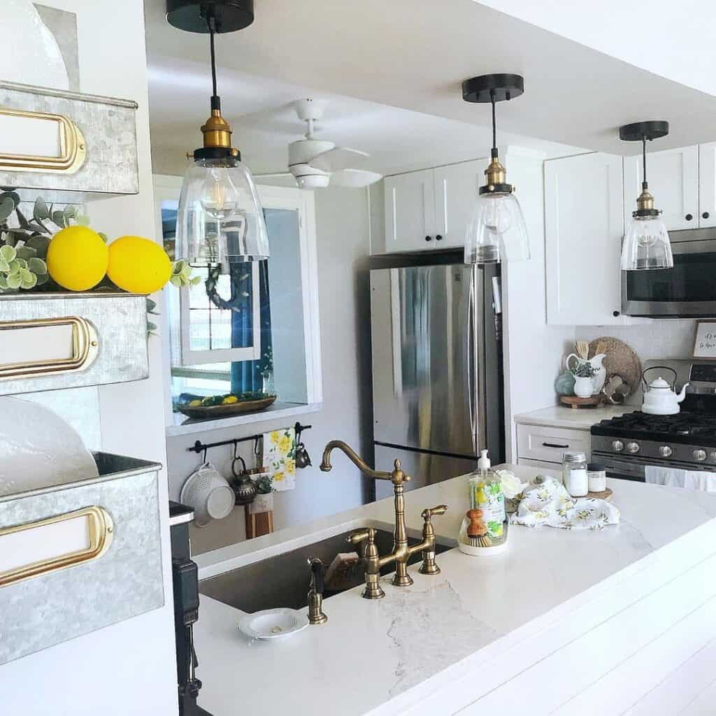 Glass Pendant Lamps Over Brass Faucet