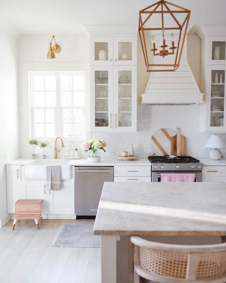 Gold Fixtures in Subway Tile Kitchen