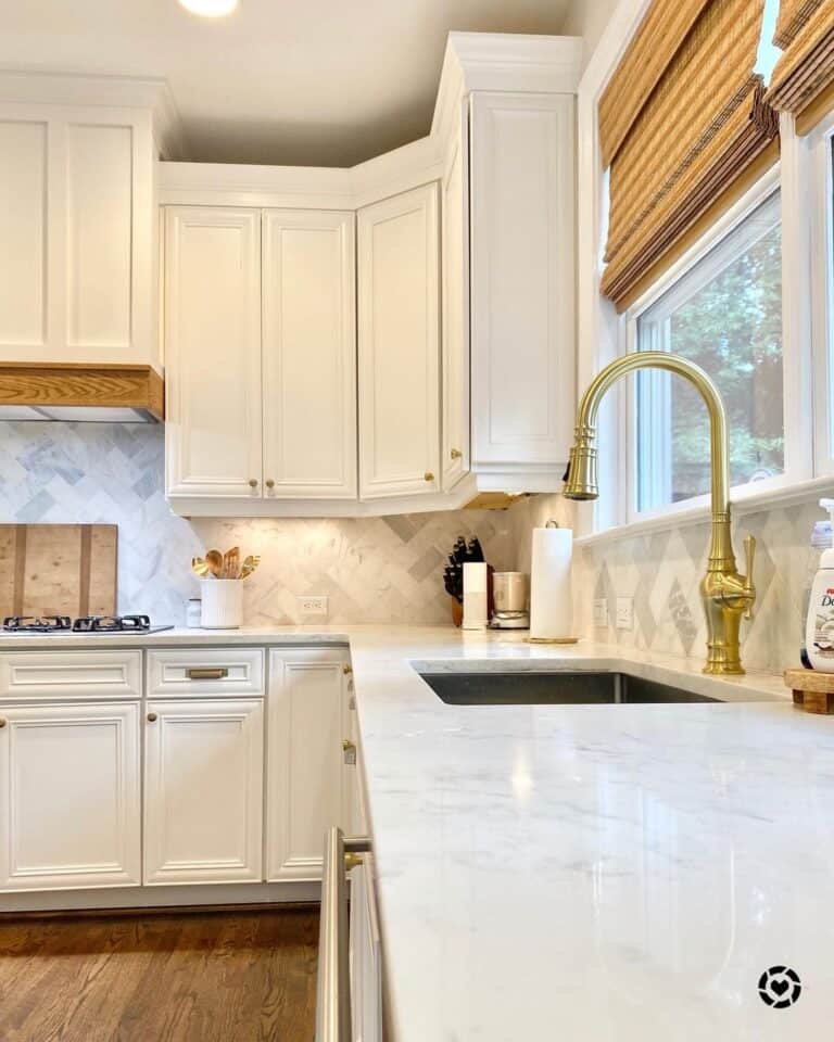 Gold Sink Faucet in White kitchen
