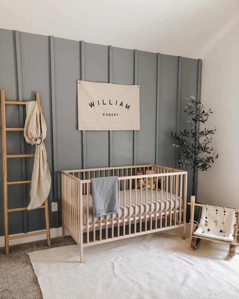 Gray Boy's Room with Wooden Crib and Blanket Ladder