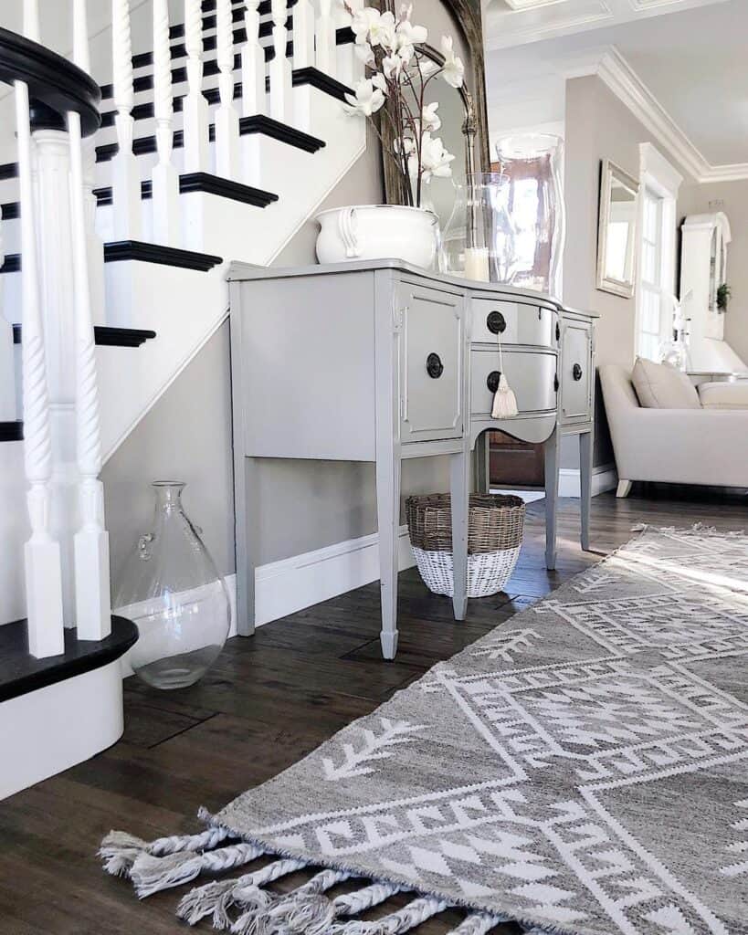 Gray Console Table Under Staircase