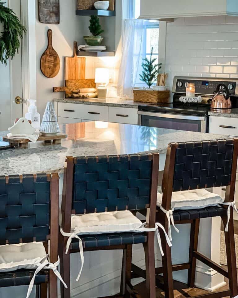 Gray Countertops and Black Woven Stools