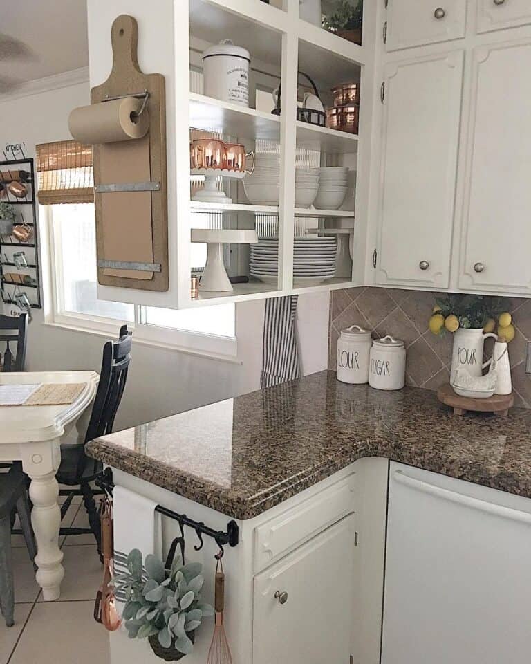 Gray Diagonal Tile Backsplash with Granite Countertops