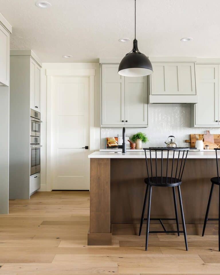 Gray Kitchen Cabinets with Herringbone Backsplash