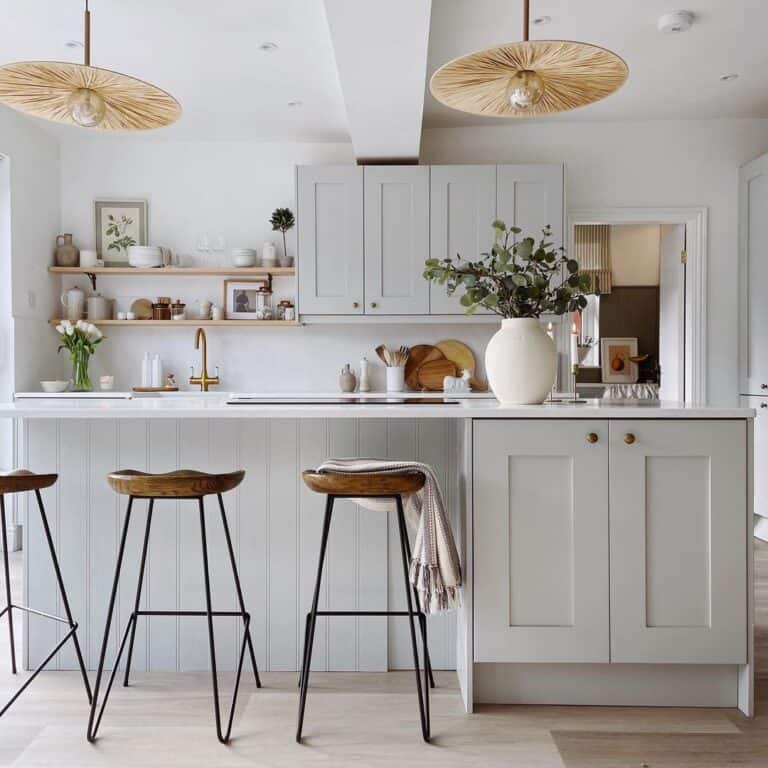 Gray Kitchen with Dark Brass Cabinet Hardware