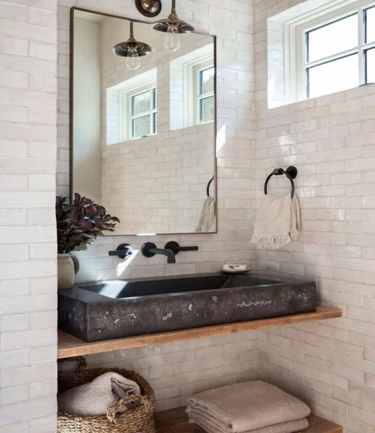 Gray Subway Tile Bathroom with Stone Sink
