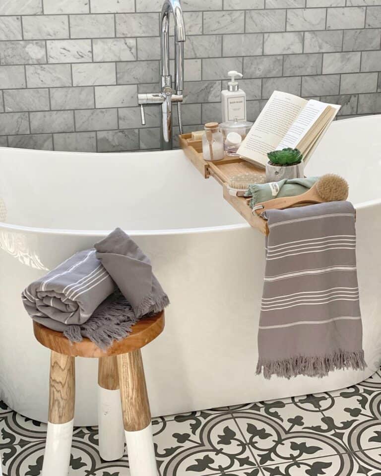 Gray Subway Tile and Freestanding Bathtub
