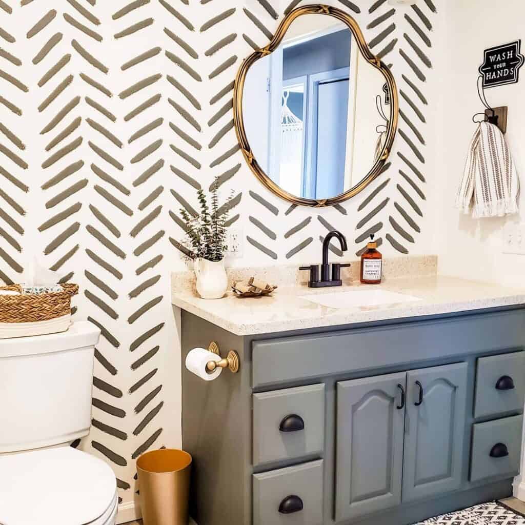 Gray Vanity and Hand Painted Wall Soul & Lane