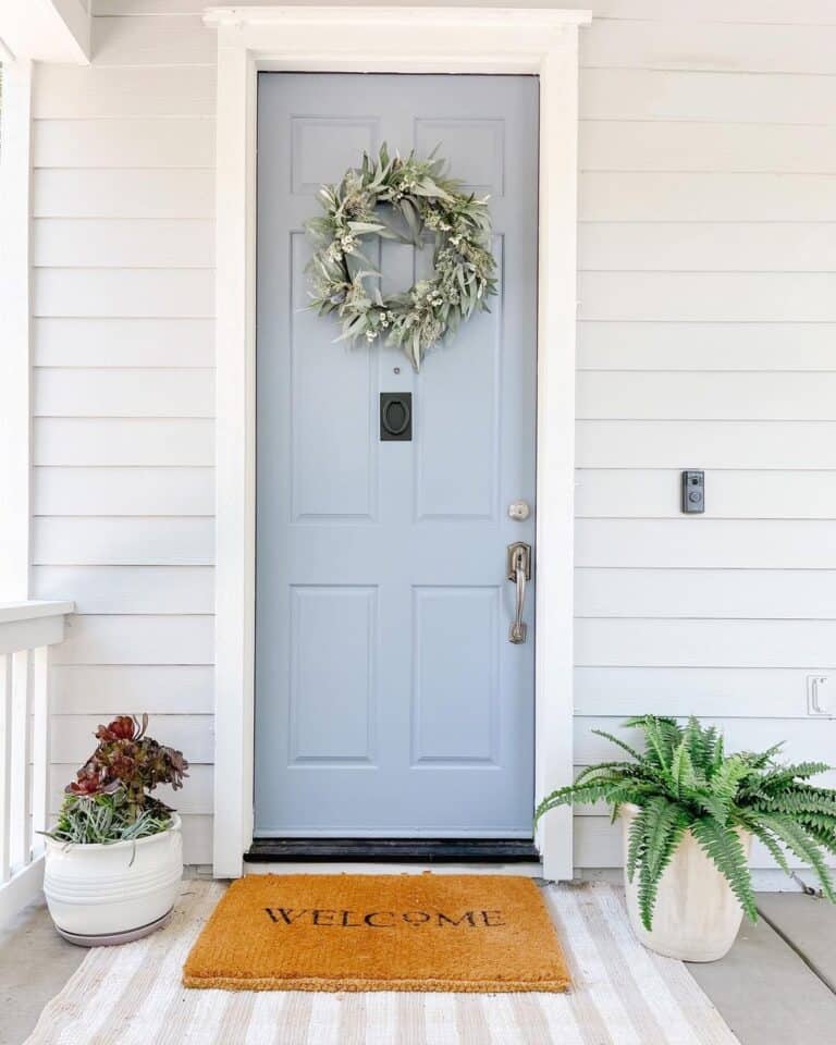 Green Wreath on a LIght Blue Front Door