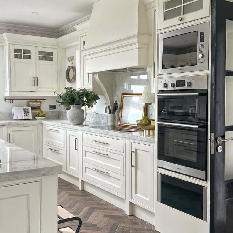 Grey and White Backsplash with Herringbone Floor