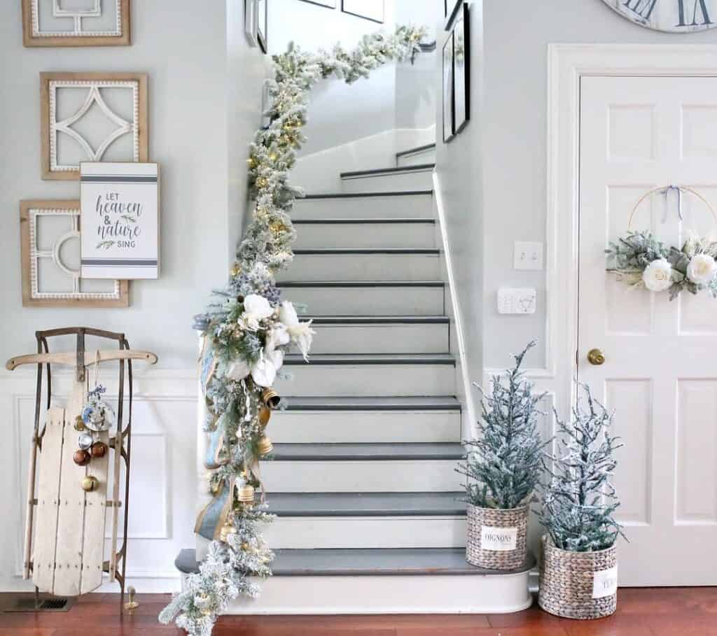 Grey and White Trim Staircase with Wood Decor