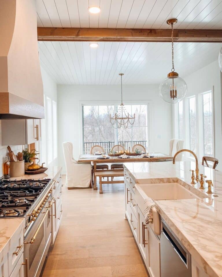 Kitchen Table Beneath White Shiplap Ceiling