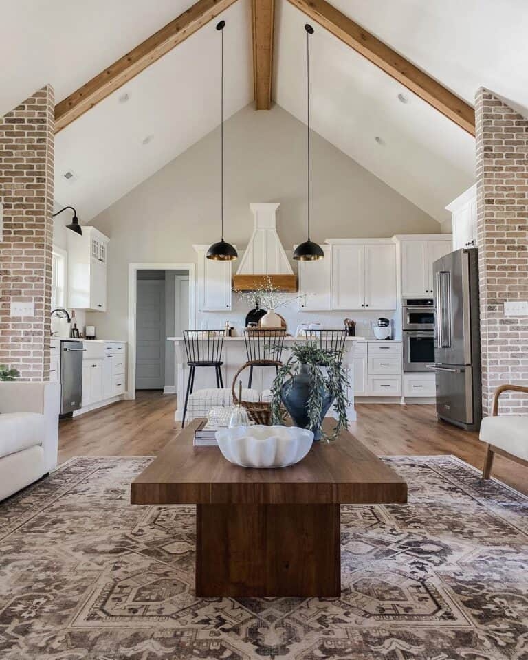 Kitchen With White and Wood Beam Vaulted Ceiling